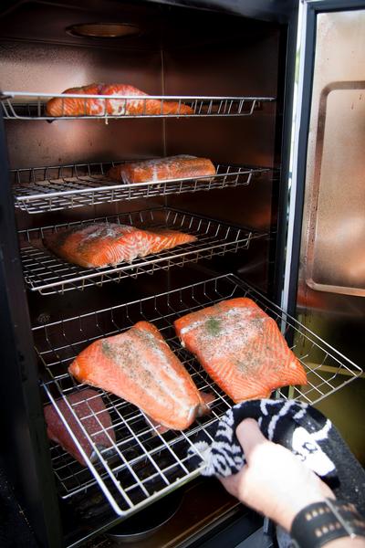 Bradley Smokers smoke fresh salmon fillets for visitors to the show to sample